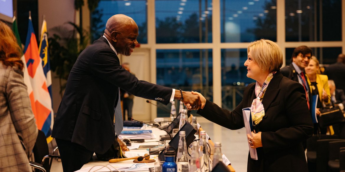 two people shaking hands