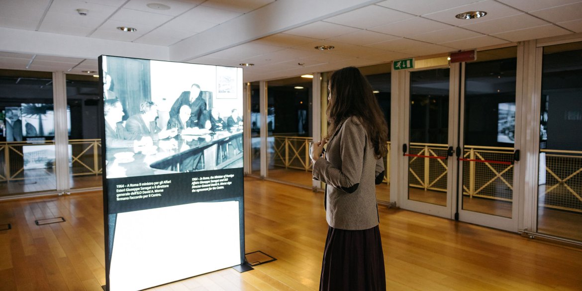 person looking at the photo exhibition