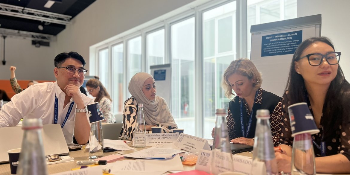 participants sitting at a table together