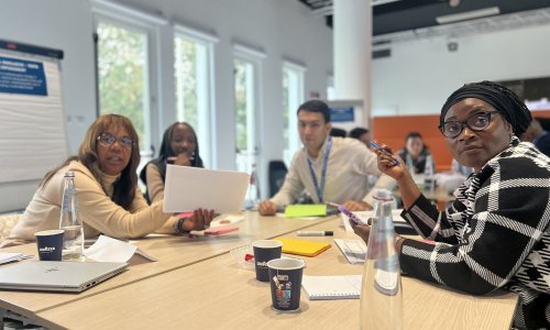 participants sitting in their group table