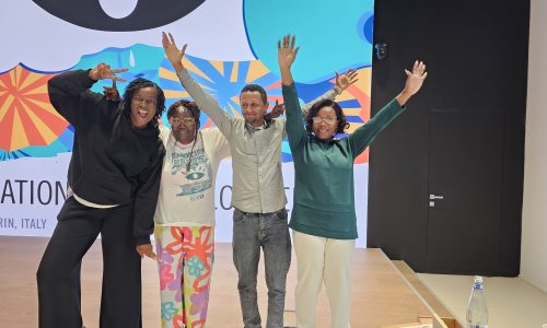 participants posing in the front of the innovation lab