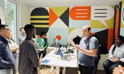 participants in the multimedia room for the podcasting course